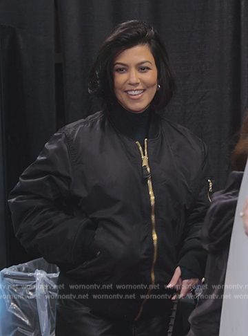 Kourtney's black bomber jacket on The Kardashians