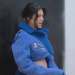 Kourtney’s blue shearling trim cropped jacket and skirt on The Kardashians