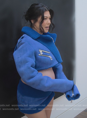 Kourtney's blue shearling trim cropped jacket and skirt on The Kardashians