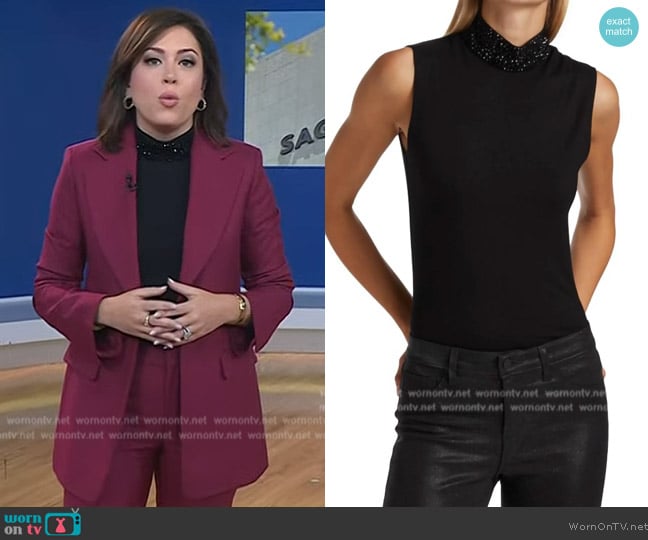 L'Agence Emily Embellished Mock Neck Top In Black worn by Chloe Melas on Today