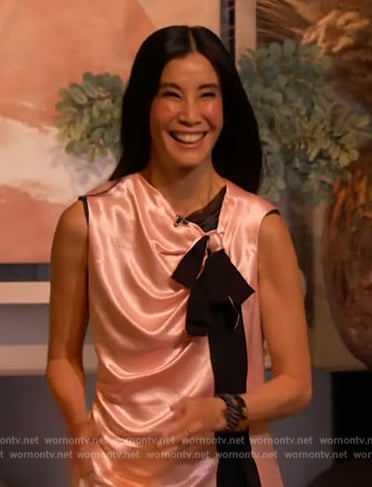 Lisa Ling's pink satin contrast tie top on The Drew Barrymore Show