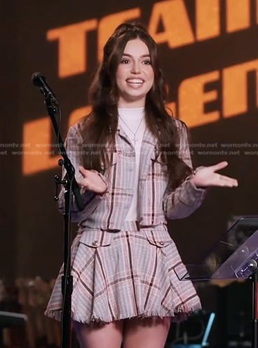 Mara Justine's plaid tweed jacket and mini skirt on The Voice