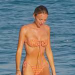 Marie Lou Nurk’s orange printed bikini on Selling Sunset