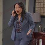 Melinda’s floral blouse and blue suit on Days of our Lives