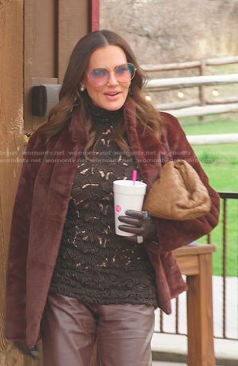 Meredith's brown bag and sunglasses on The Real Housewives of Salt Lake City
