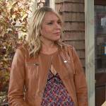 Nicole’s floral pleated dress and beige leather jacket on Days of our Lives