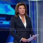 Norah’s navy pinstripe suit on CBS Evening News