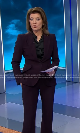 Norah's plum blazer and pants on CBS Evening News