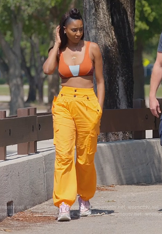 Guerdy's orange utility pants on The Real Housewives of Miami