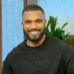 Tyler Lepley’s black prada logo sweatshirt on Tamron Hall Show