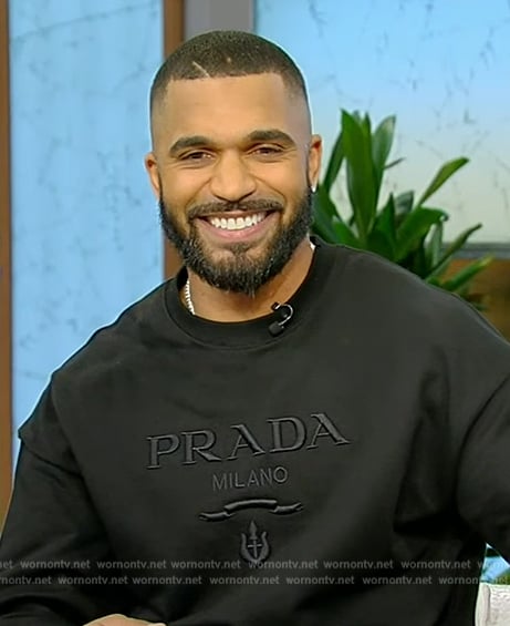 Tyler Lepley’s black prada logo sweatshirt on Tamron Hall Show