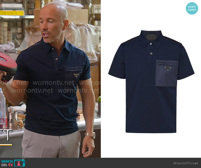 Prada Triangle logo polo shirt worn by Brett Oppenheim on Selling Sunset