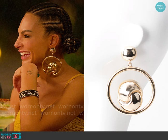 Recess Oversized Knotted Hoop Earrings worn by Amanza Smith on Selling Sunset