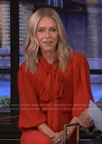 Kelly's red tie neck blouse on Live with Kelly and Mark