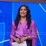 Reena’s purple satin draped wrap blouse on Good Morning America