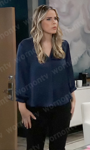 Sasha’s blue v-neck satin blouse on General Hospital