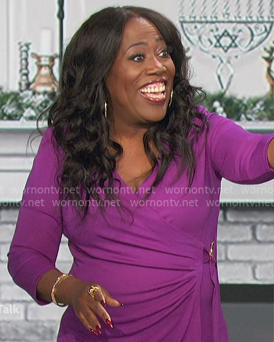 Sheryl’s purple wrap top on The Talk