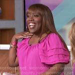 Sheryl’s pink short sleeve top on The Talk