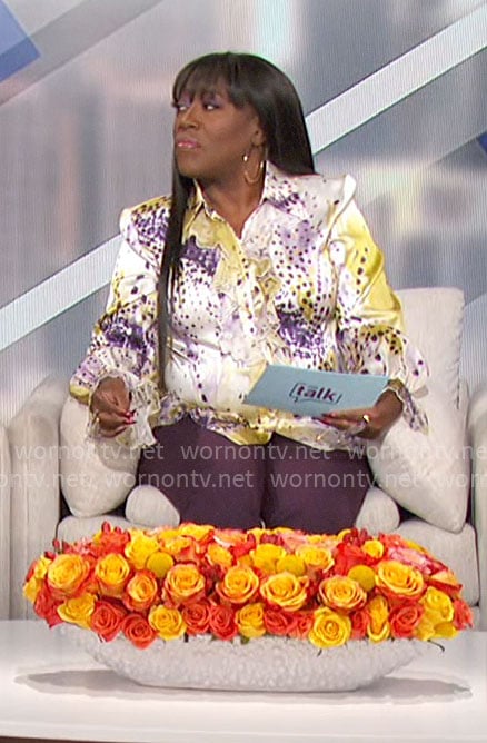 Sheryl's purple and yellow printed blouse on The Talk