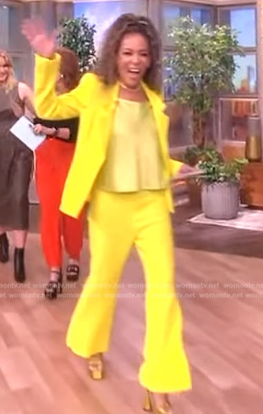 Sunny’s yellow blazer and wide leg pants on The View