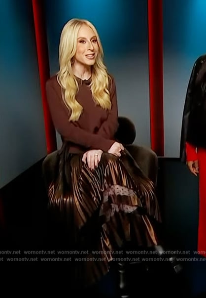 Sydney Sadick’s brown pleated sweater dress on Access Hollywood