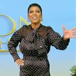 Tamron’s black polka dot blouse and pants on Tamron Hall Show