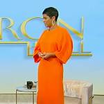 Tamron’s orange maxi dress on Tamron Hall Show