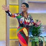 Tamron’s abstract print top and skirt on Tamron Hall Show