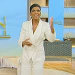 Tamron’s white metallic trim blazer on Tamron Hall Show