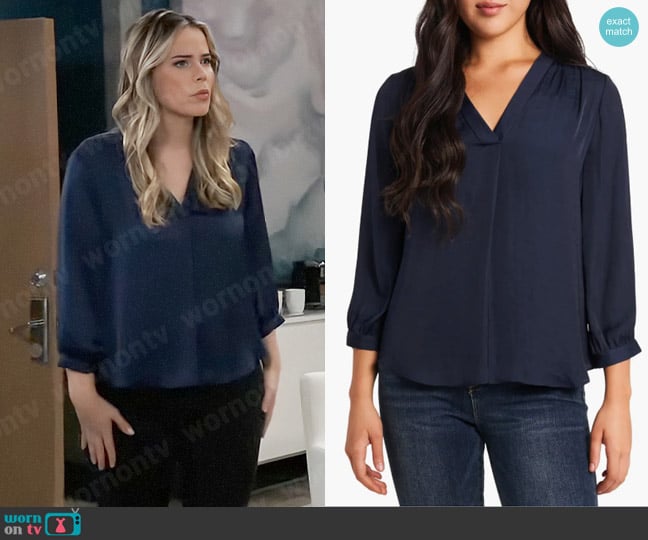 Vince Camuto Rumple Fabric Blouse in Classic Navy worn by Sasha Gilmore (Sofia Mattsson) on General Hospital