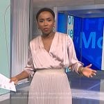 Zinhle’s pink satin wrap blouse and pleated skirt on NBC News Daily