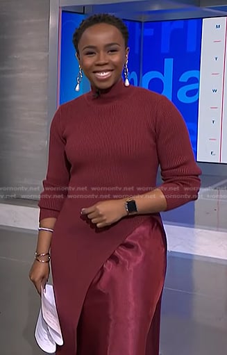 Zinhle’s red ribbed asymmetric sweater on NBC News Daily