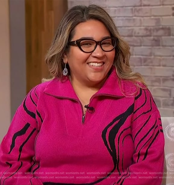 Zuli Garcia's pink printed half zip sweater on Sherri