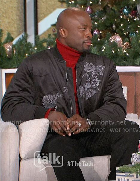 Akbar’s black floral embroidered bomber jacket on The Talk