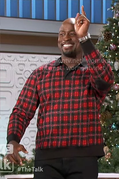 Akbar’s red checked polo sweater on The Talk