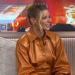 Ariana’s brown leather mini skirt and orange shirt on The Kelly Clarkson Show