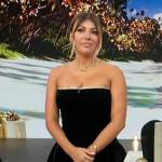 Black velvet strapless mini dress on Access Hollywood