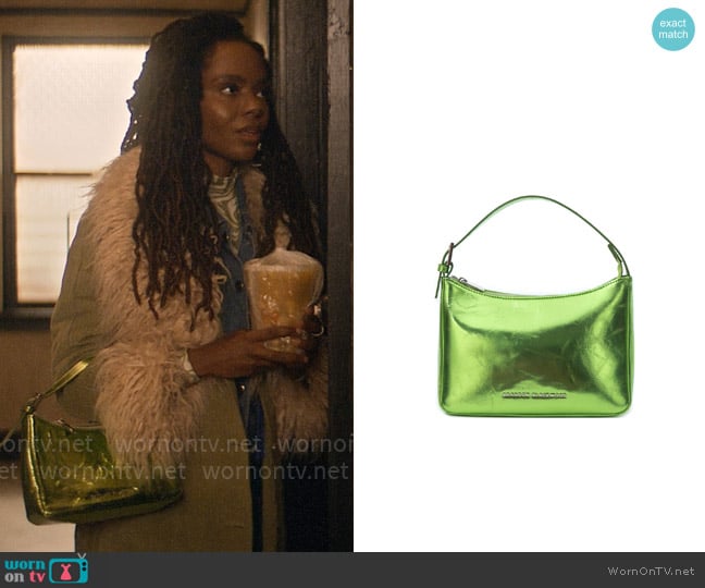 Hazel’s green metallic bag on The Other Black Girl