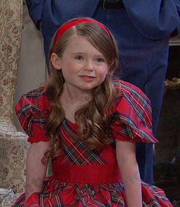 Charlotte’s red plaid puff sleeve dress on Days of our Lives