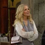 Christine’s grey wrap sweater with white sleeves on The Young and the Restless