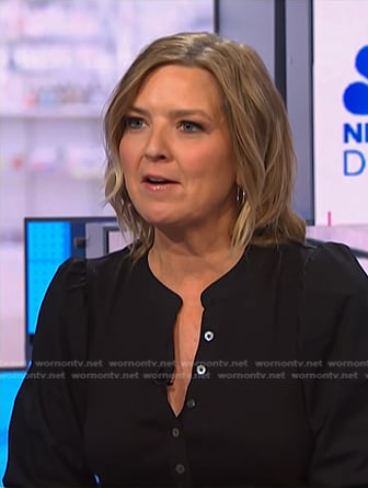 Christine Romans’s black puff sleeve top on NBC News Daily