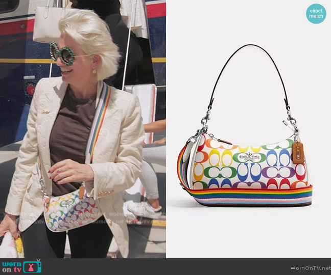 Coach Teri Shoulder Bag In Rainbow Signature Canvas worn by Dorinda Medley on The Real Housewives Ultimate Girls Trip