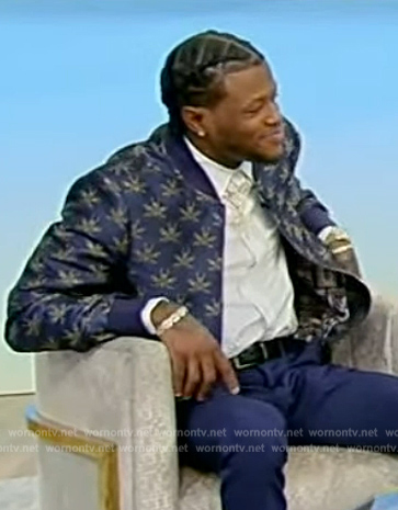 D.C. Young Fly’s blue bee embroidered bomber jacket on Tamron Hall Show