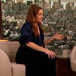 Drew’s navy tie neck blouse on The Drew Barrymore Show