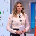 Ellison’s white floral sweater and navy pants on NBC News Daily