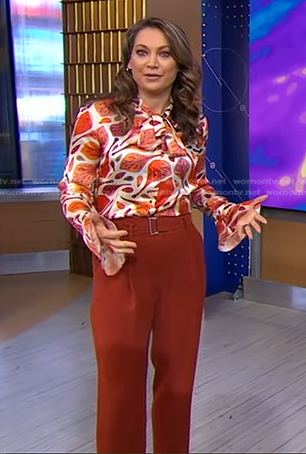 Ginger's white print tie neck blouse and brown pants on Good Morning America