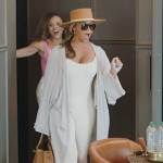 Gizelle’s white bodysuit and hat on The Real Housewives of Potomac