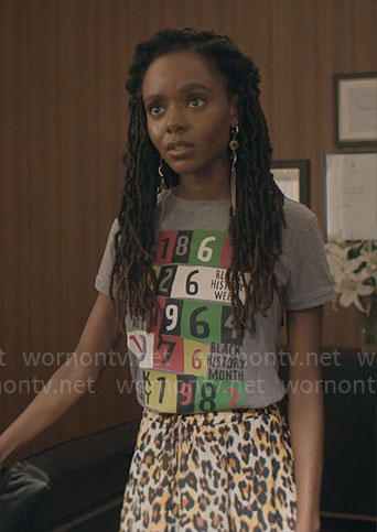 Hazel's Black History Month t-shirt and leopard skirt on The Other Black Girl