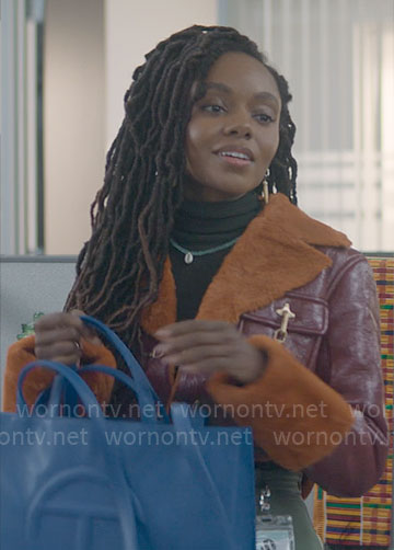 Hazel’s red and orange leather and fur jacket on The Other Black Girl