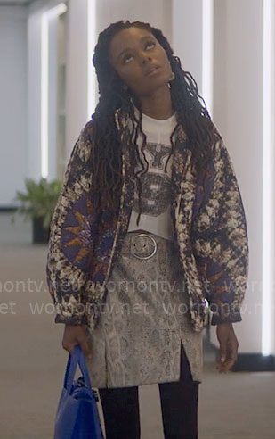 Hazel’s printed quilted jacket with grey snake print skirt and NYC crop top on The Other Black Girl